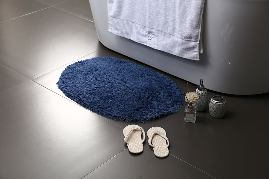 Absorbent floor mat 