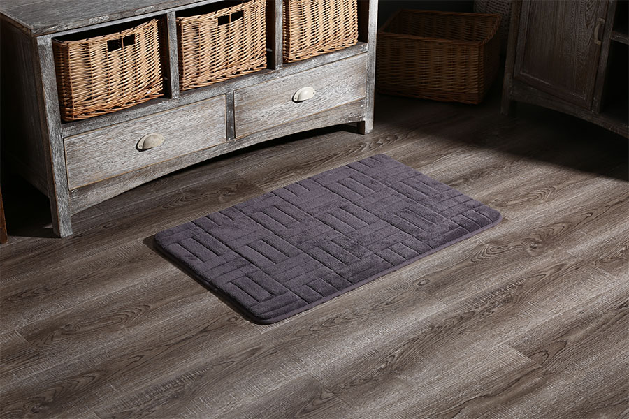 Embossed memory foam absorbent floor mat