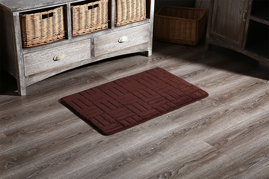 Embossed memory foam absorbent floor mat