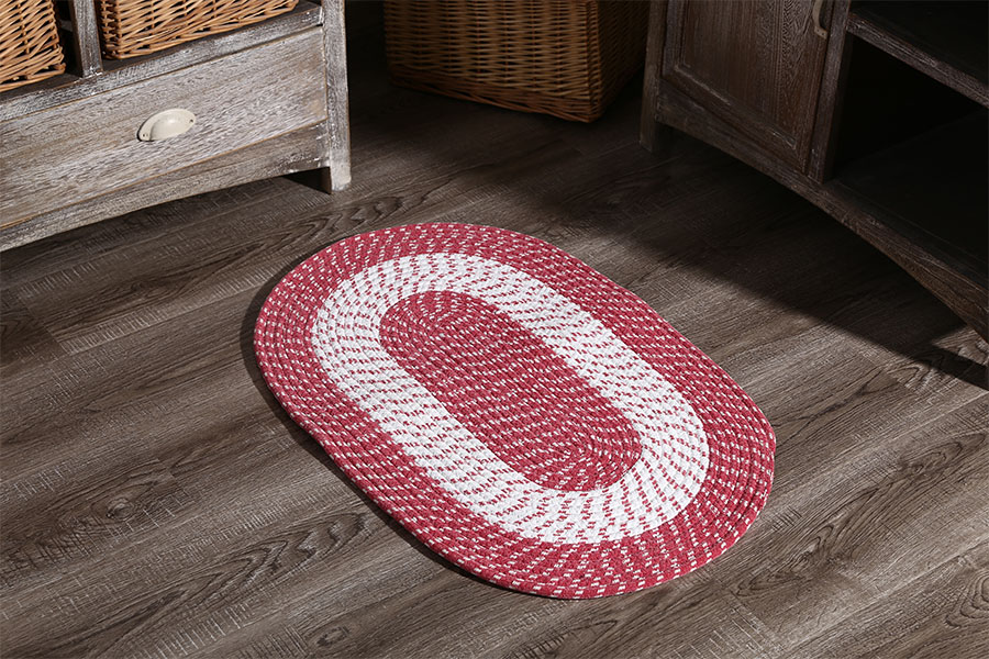 Double sided oval woven floor mat